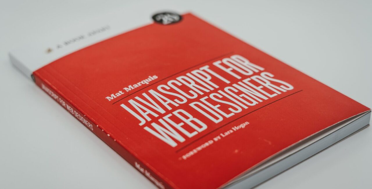 The red book with white name JavaScript for webdesigners symbolyse this article that will help understand advantages of JavaScript for web
