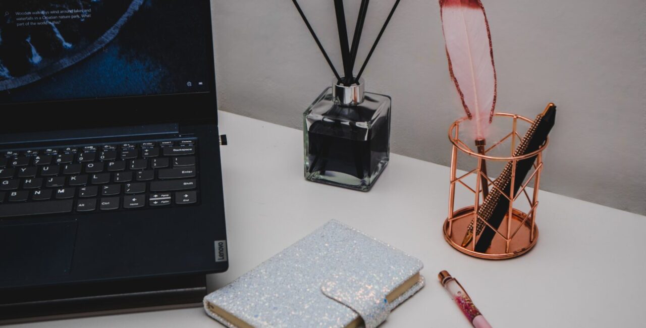 The laptop, notebook on white table