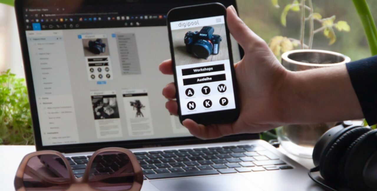 Somebody tests mobile and desctop verisons of a startup website design
