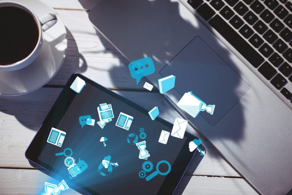 digital composite of smart devices with coffee on table with UI design elements