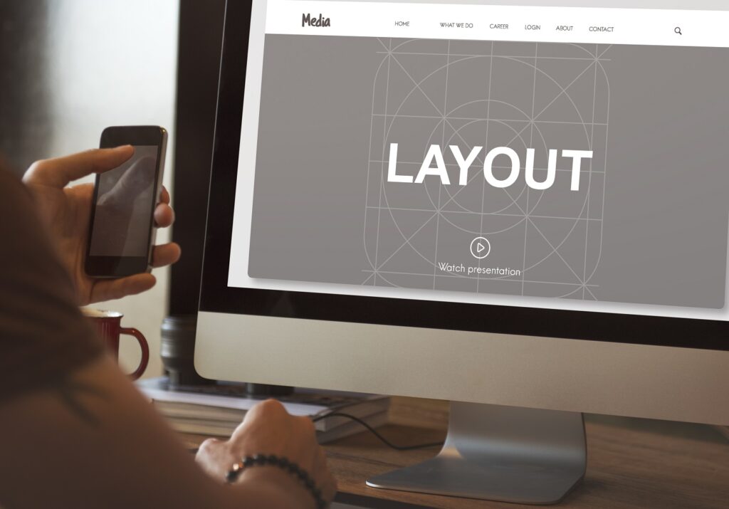 A web designer creates layout for the b2b website